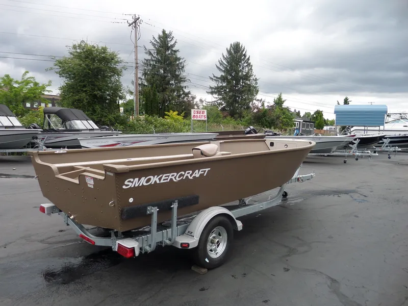 Slide: The Image of 2017 Smoker Craft Freedom boat on trailer in outdoor lot. - 7