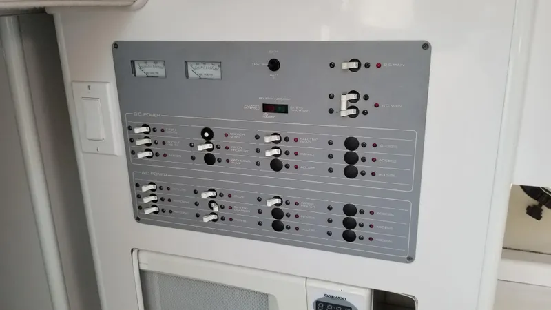 Slide: The Image of Electrical control panel of a 1993 Tiara Yachts 270 Sport Cruiser. - 3