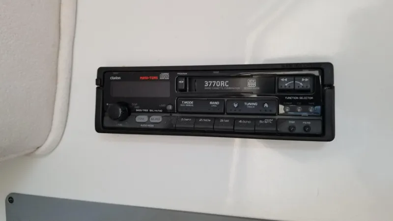 Slide: The Image of 1993 Tiara Yachts 270 Sport Cruiser dashboard with Clarion 3770RC stereo system. - 31