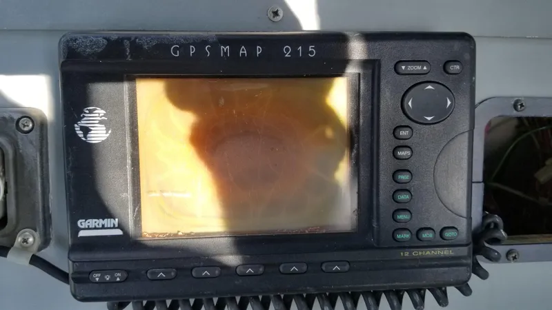 Slide: The Image of Garmin GPSMAP 215 on 1993 Tiara Yachts 270 Sport Cruiser dashboard. - 39