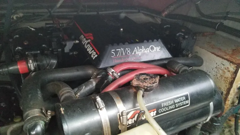 Slide: The Image of 1993 Tiara Yachts 270 Sport Cruiser engine compartment with MerCruiser 5.7L V8 Alpha One. - 47