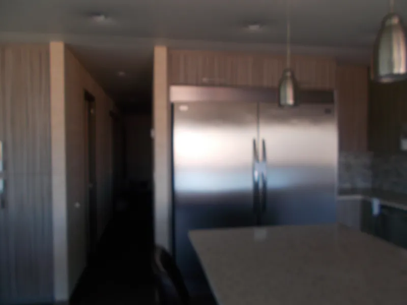 Slide: The Image of Modern kitchen interior with stainless steel appliances and pendant lighting, Adonia Titan Trip 9, 2016. - 14