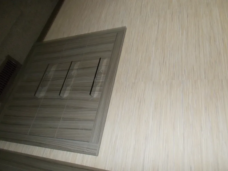 Slide: The Image of Wooden panel with three vertical slits on a textured wall, Adonia Titan Trip 9, 2016. - 29