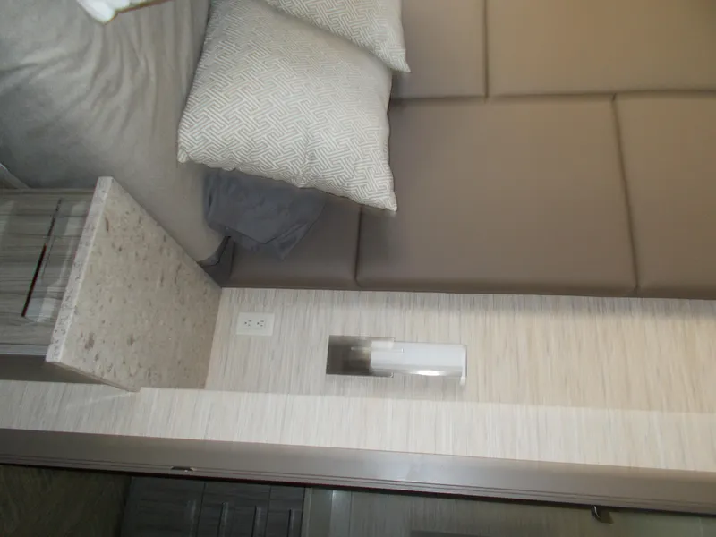 Slide: The Image of Interior of 2016 Adonia Titan Trip 9, featuring modern design and comfortable bedding. - 30