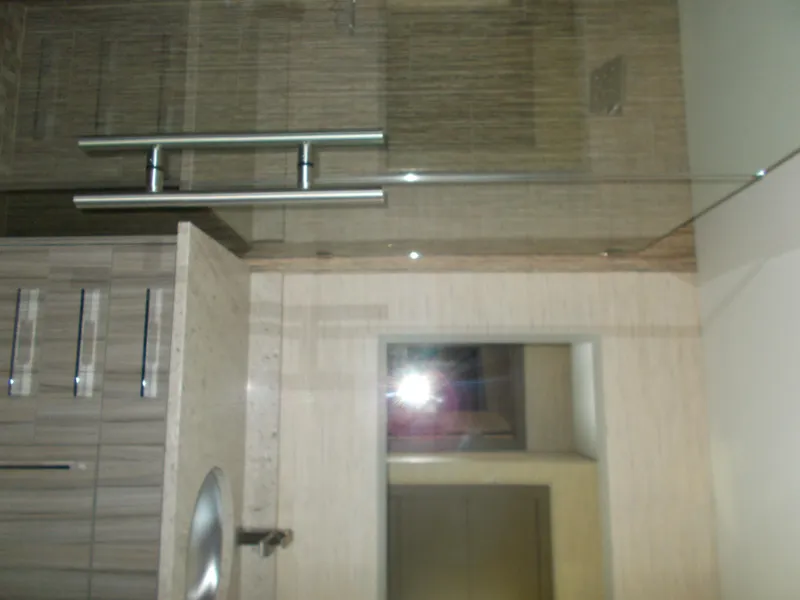 Slide: The Image of Modern bathroom with sleek fixtures in Adonia Titan Trip 9, 2016 model. - 31
