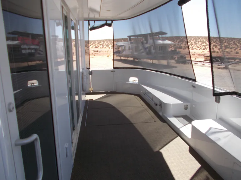 Slide: The Image of Adonia Titan Trip 9 houseboat deck, 2016 model, with spacious seating and scenic views. - 35