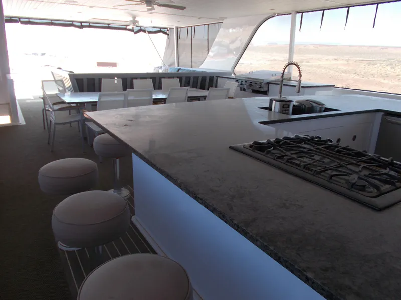 Slide: The Image of Luxurious 2016 Adonia Titan Trip 9 yacht interior with modern kitchen and dining area. - 45