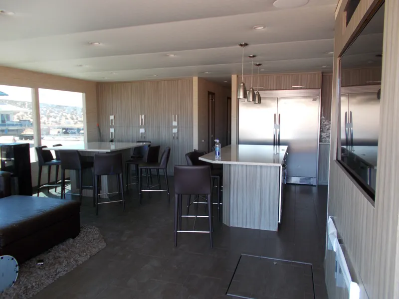 Slide: The Image of Modern kitchen and dining area in 2016 Adonia Titan Trip 9 houseboat. - 9