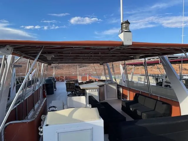 Slide: The Image of Top deck of 2007 American Waterways Houseboat Sundancer Trip #17 with seating and shade. - 15