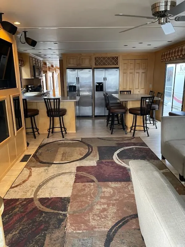 Slide: The Image of Interior of 2007 American Waterways Houseboat Sundancer Trip #17 with modern kitchen and seating area. - 20