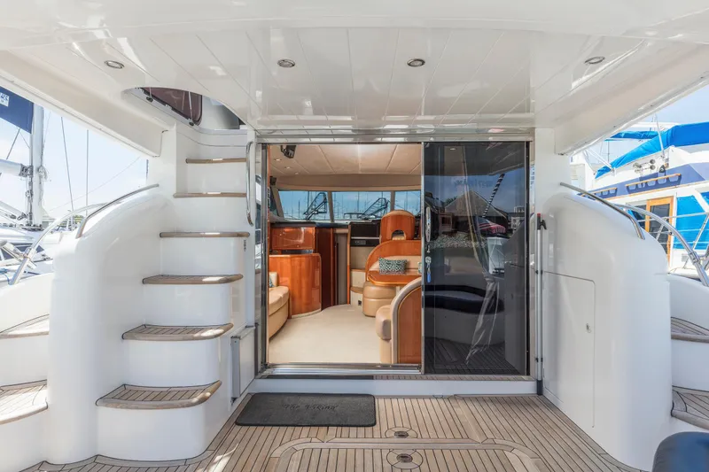 Slide: The Image of Luxurious bathroom interior of 2007 Viking Sport Cruiser with wood accents and modern fixtures. - 29