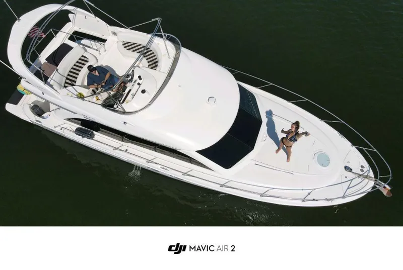 Slide: The Image of Aerial view of 2006 Meridian 411 Sedan yacht on water. - 3