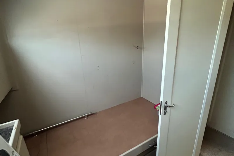 Slide: The Image of Empty interior space on a 1991 Hatteras Cockpit Motor Yacht. - 16