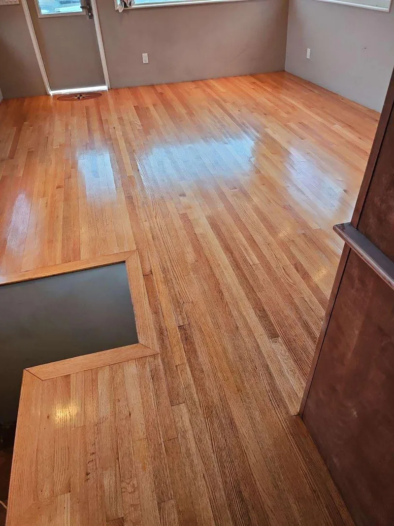 Slide: The Image of Polished wooden floor inside a 1991 Hatteras Cockpit Motor Yacht, showcasing elegant interior design. - 40