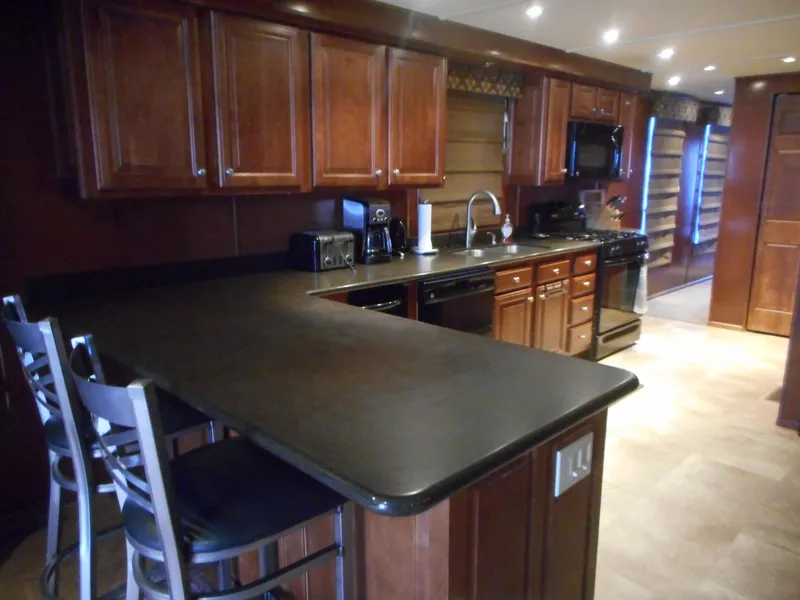 Slide: The Image of Kitchen in a 2008 Sharpe Kohala Sun Trip RV. - 12