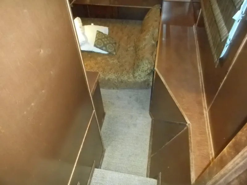 Slide: The Image of Interior of a 2008 Sharpe Kohala Sun Trip yacht with cozy sofa. - 14