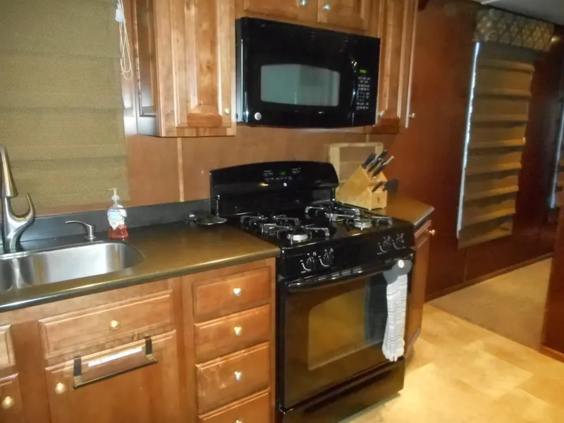 Slide: The Image of Kitchen in a 2008 Sharpe Kohala Sun Trip RV. - 16