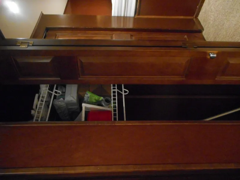Slide: The Image of Wooden cabinet with open doors and shelves, Sharpe Kohala Sun Trip 2008. - 20