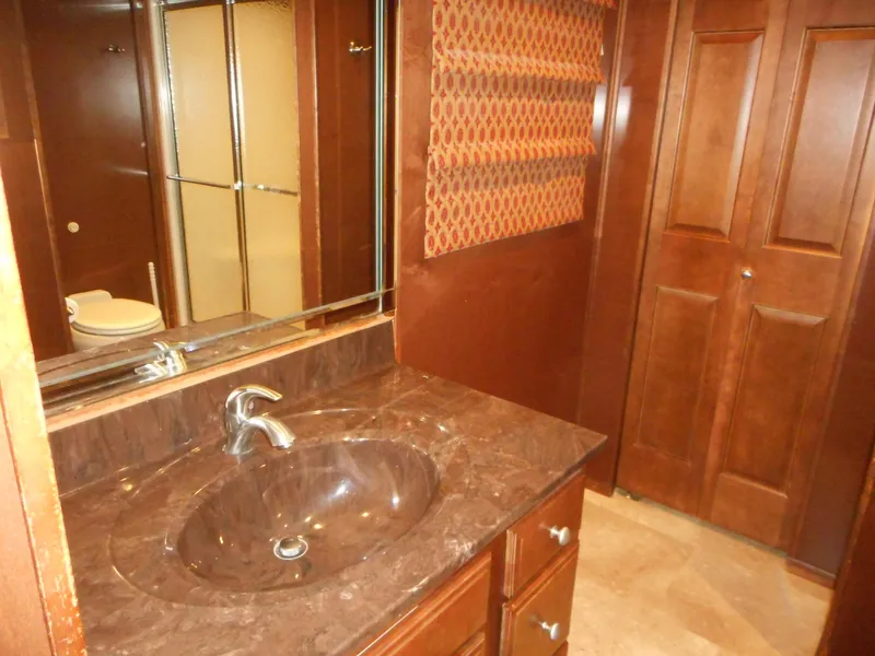 Slide: The Image of Bathroom with marble sink and wooden doors, Sharpe Kohala Sun Trip 2008. - 30
