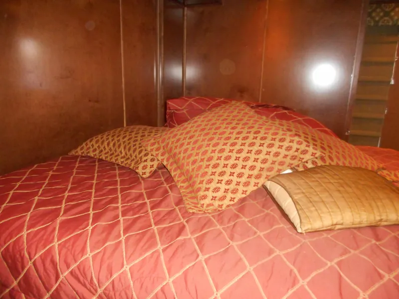 Slide: The Image of Cozy bedroom with red pillows and quilt, Sharpe Kohala Sun Trip 2008. - 33