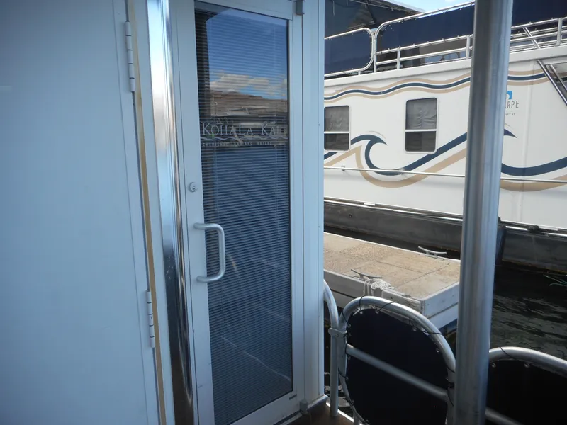 Slide: The Image of Entrance door of a Sharpe Kohala Sun Trip houseboat, 2008. - 36