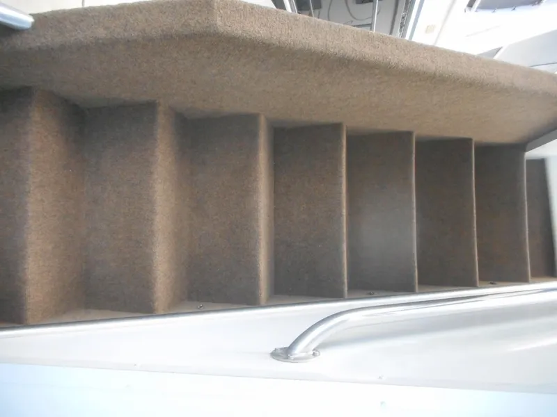 Slide: The Image of Carpeted stairs with metal railing on a Sharpe Kohala Sun Trip boat. - 41
