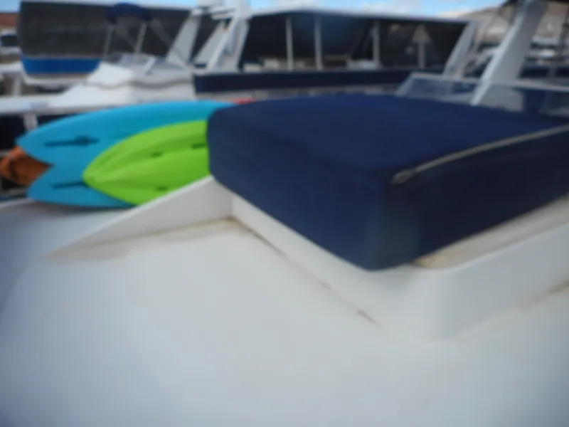 Slide: The Image of Boat deck with blue cushion and kayaks, Sharpe Kohala Sun Trip 2008. - 48