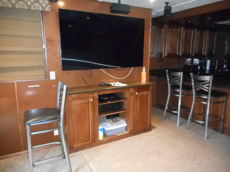 Slide: The Image of Living room with large TV and wooden furniture, Sharpe Kohala Sun Trip 2008. - 9