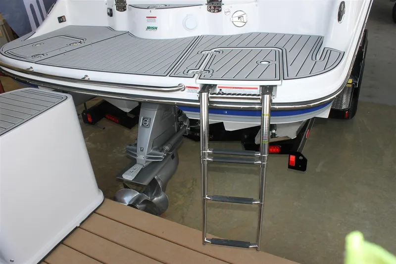 Slide: The Image of 2018 Bryant Potenza boat with swim platform and ladder in a garage setting. - 26