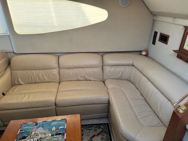 Slide: The Image of Luxurious beige leather seating in 2000 Cruisers Yachts 4450 Express Motor Yacht interior. - 40