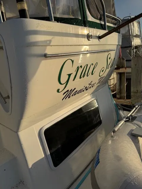 Slide: The Image of 2000 Cruisers Yachts 4450 Express Motor Yacht docked, featuring "Grace Sea" name on the stern. - 18