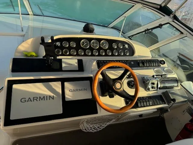 Slide: The Image of Helm of 2000 Cruisers Yachts 4450 Express Motor Yacht with Garmin navigation system. - 24