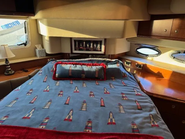 Slide: The Image of Luxurious cabin interior of 2000 Cruisers Yachts 4450 Express Motor Yacht. - 33