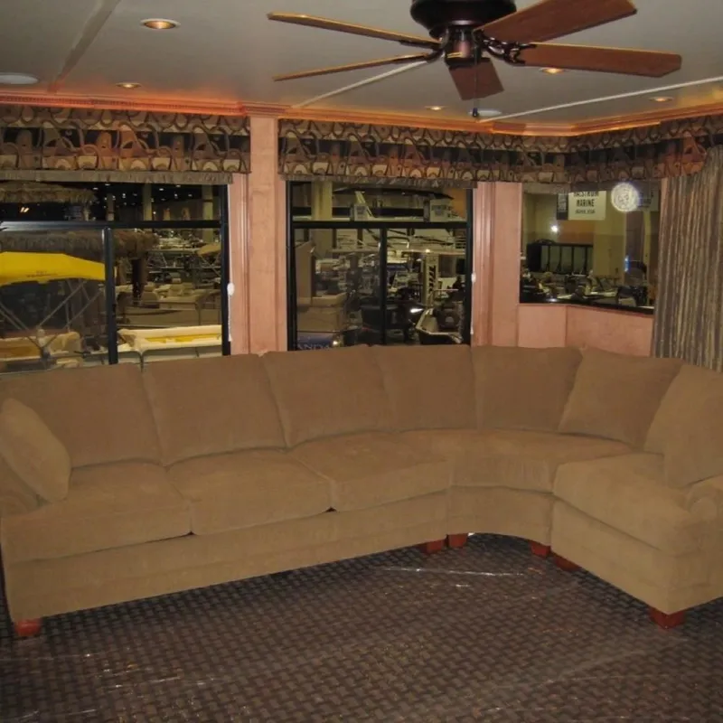 Slide: The Image of Luxurious interior of 2009 Sumerset Summer Breeze Trip #12 with plush sectional sofa. - 5