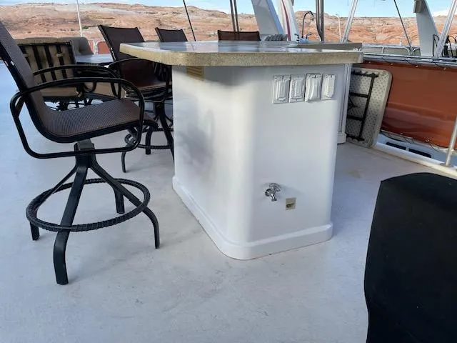 Slide: The Image of Outdoor seating area on a 2007 American Waterways Sundancer Trip 16 boat. - 19