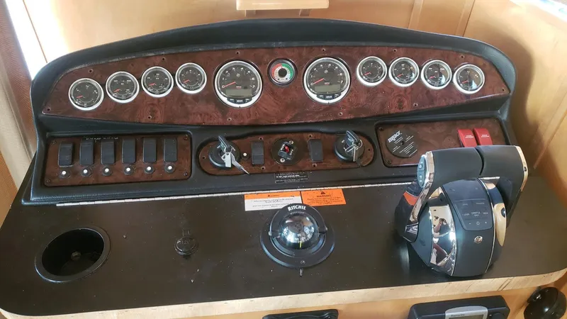 Slide: The Image of Control panel of a 2007 American Waterways Sundancer Trip 16 boat. - 23