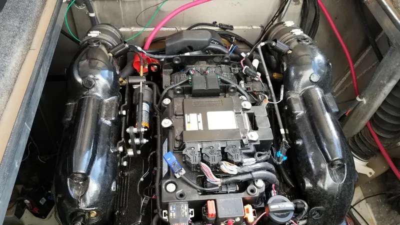 Slide: The Image of Engine compartment of a 2007 American Waterways Sundancer Trip 16 boat. - 24