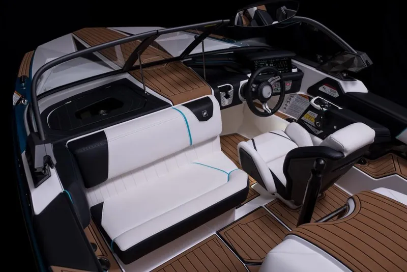 Slide: The Image of 2023 Nautique Ski boat interior with modern dashboard and luxurious seating. - 43