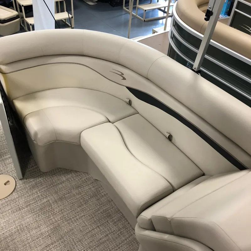 Slide: The Image of Interior of a 2018 Bennington 22SSRX with beige leather seating. - 10