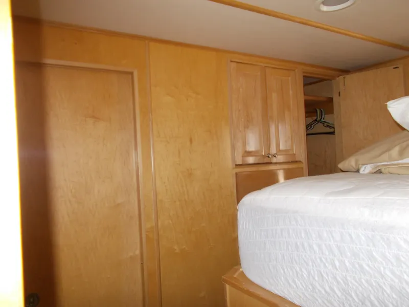 Slide: The Image of Interior cabin of 2005 Stardust Cruisers Summer Obsession Trip 36 with wooden cabinetry. - 12
