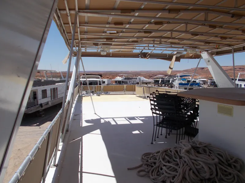 Slide: The Image of Top deck of 2005 Stardust Cruisers Summer Obsession Trip 36 houseboat with chairs and ropes. - 24