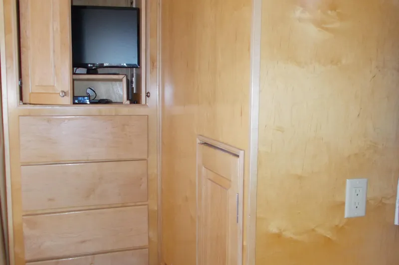 Slide: The Image of Interior of 2005 Stardust Cruisers Summer Obsession Trip 36 with wooden cabinetry and TV. - 5