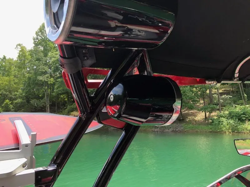 Slide: The Image of 2015 Supra SE 450 boat speakers and tower, set against a scenic lake backdrop. - 21