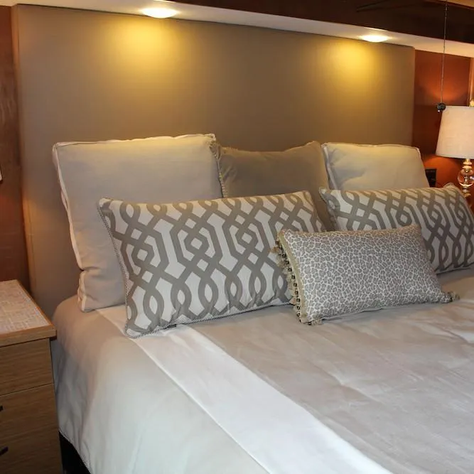 Slide: The Image of Luxurious bedroom in 2014 Bravada Infinity Trip #1 houseboat with elegant pillows and ambient lighting. - 10