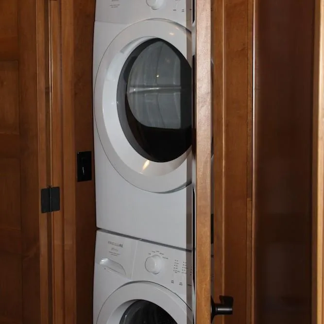 Slide: The Image of Stacked washer and dryer in wooden closet, Bravada Infinity Trip #1, 2014 model. - 12
