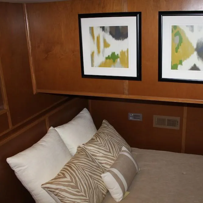 Slide: The Image of Cozy bedroom in 2014 Bravada Infinity Trip #1 houseboat with abstract wall art. - 18