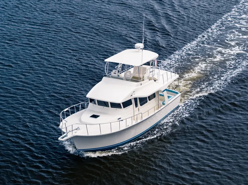 The Image of 2025 Henriques 42 Cruiser yacht sailing on open water. - 0