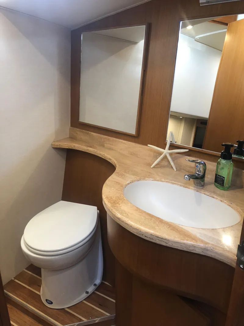 Slide: The Image of Modern bathroom in 2025 Henriques 42 Cruiser yacht with sink and toilet. - 9
