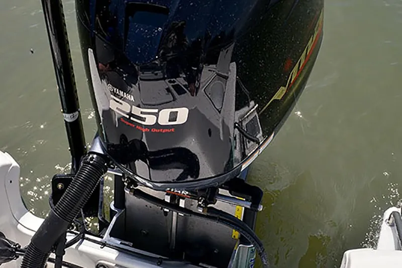 Slide: The Image of 2023 NauticStar 227 XTS with Yamaha 250 outboard motor in water. - 14