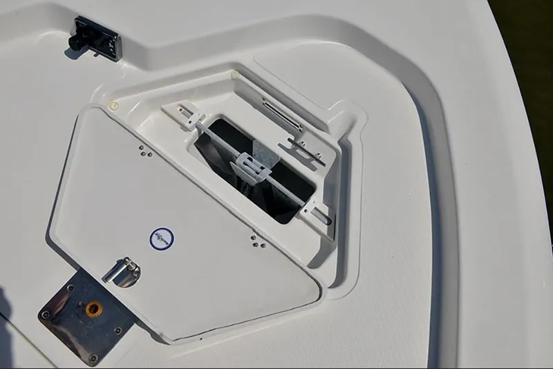 Slide: The Image of 2023 NauticStar 227 XTS boat anchor storage compartment. - 9
